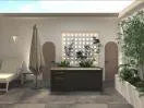 A modern outdoor patio featuring a central dark wooden island with plants, flanked by beige benches and a lounge chair with an umbrella. The serene space is enhanced by Chill Tubs - Professional affordable Ice Baths ideal for gym fanatics from Chill Tubs, potted greenery, and a decorative lattice wall with additional plants.