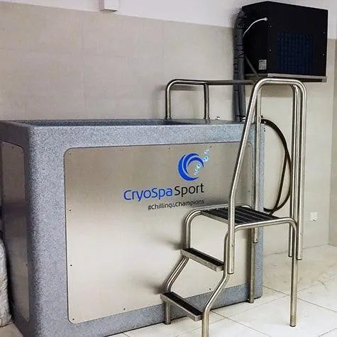 The image showcases a CryoSpa Sport - Cold Water Ice Bath by CET CryoSpas, a metal and plastic tub used for therapeutic cold treatments and athlete recovery. The unit features an attached set of steps for easy access. The CET CryoSpas logo and the tagline "#chilling4champions" are prominently displayed on the side.