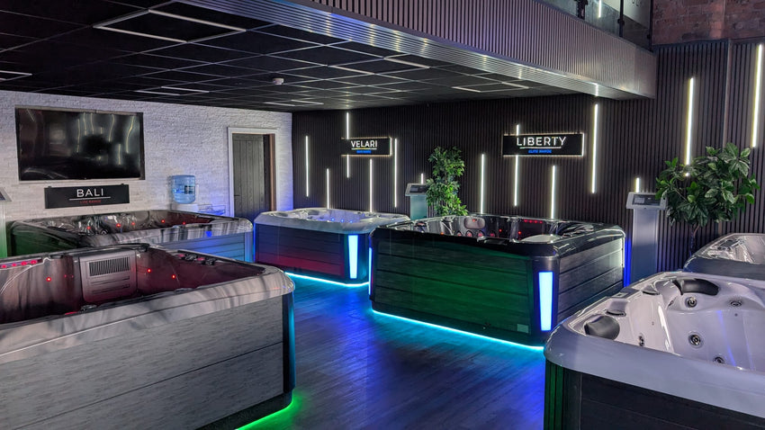 Bali, Velari and Liberty hot tubs with colourful lighting in Hot Tub Liverpool's showroom