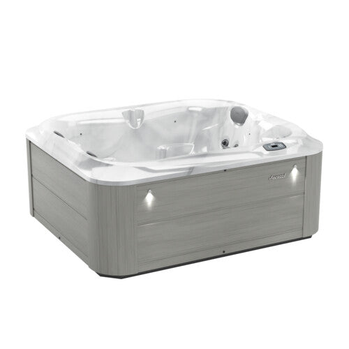 Hot tub with gray exterior and white interior on a white background