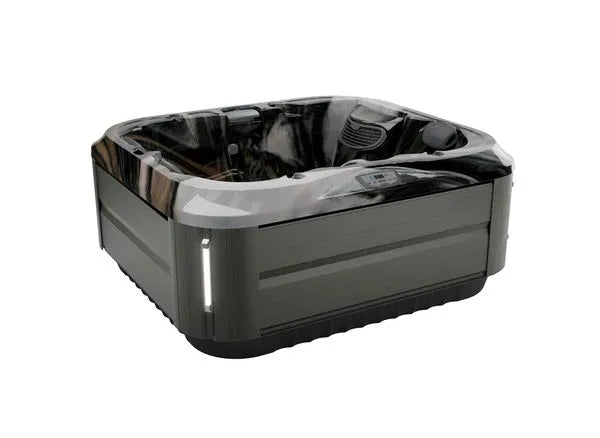 A square, modern petite hot tub with a sleek, dark exterior and a smooth, marble-like interior finish. It features built-in seating, multiple PowerPro® jets, and control panel designed for relaxation and hydrotherapy benefits. The **Jacuzzi J-315 COMFORT HOT TUB WITH LOUNGER FOR SMALL SPACES** includes an integrated LED light strip.