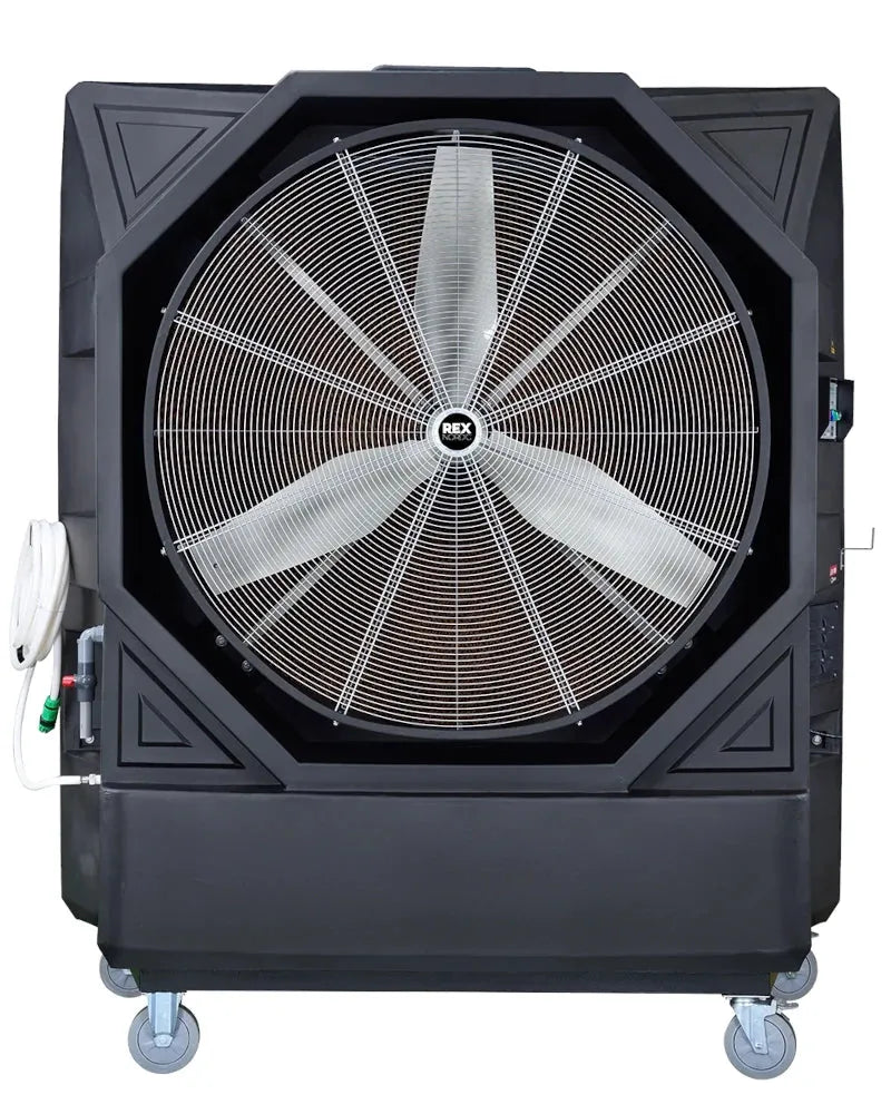 A large, industrial-grade Rex Evaporative Cooler - REX48000 with a black octagonal frame and metallic blades. The fan, boasting eco-friendly cooling from Rex Nordic, is mounted on wheels for mobility and has various knobs and switches on the side for control. A coiled white cable is hanging from the side.