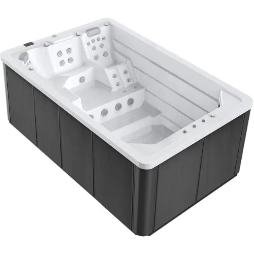 A sleek, modern **Oasis Riptide - Easy Life Pro 4.4 with Inverter Swim Spa** with a white interior and a black exterior. The **Oasis Spas** hot tub features multiple jets for hydrotherapy, ergonomic seating, and steps for easy access. With smooth edges contributing to its elegant design, it also includes touchscreen controls for a customized spa experience.