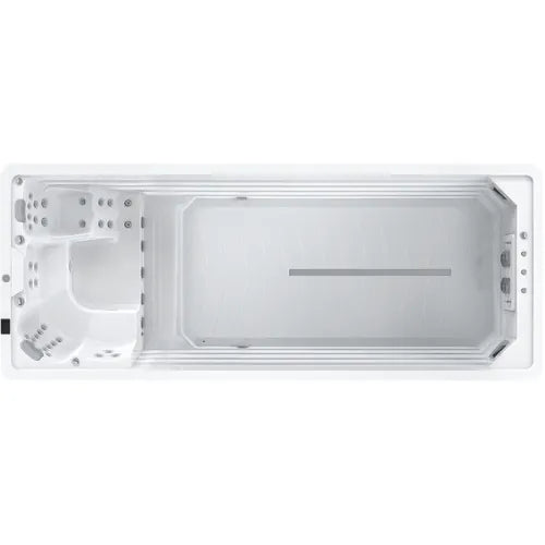 A top-down view of an Oasis Riptide - Easy Life Pro 6.0 with Inverter Swim Spa by Oasis Spas with a white interior. The spa features a seating area with multiple jets on the left side, including 3-inch Power Flow Swim Jets, and an open swim area with a line marker in the center, indicating a lane for swimming in place.