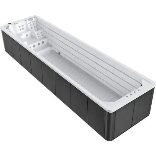 A long, rectangular, above-ground swimming pool with dark exterior panels and a white interior. The pool features built-in seating with SPATECH TP10 Power Flow Swim Jets at one end. The **Oasis Riptide - Easy Life Pro 8.0 with Inverter Swim Spa** by **Oasis Spas** is empty and displayed against a white background.