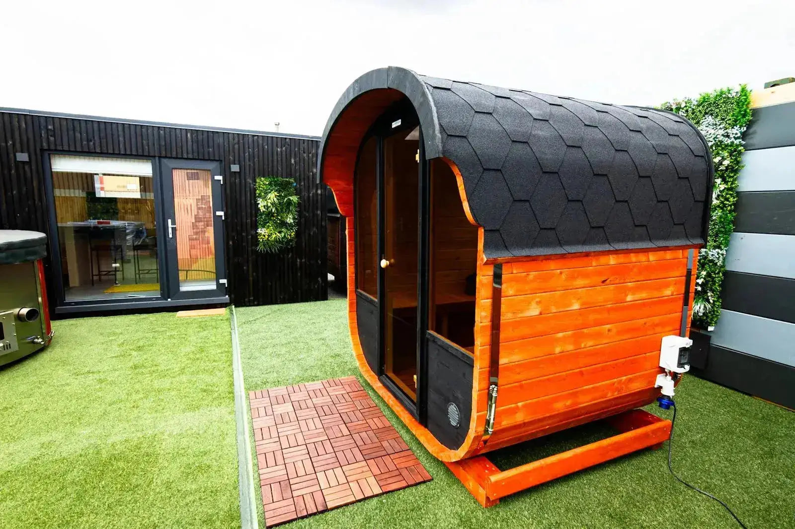 Woodpecker 2024 Cube Sauna on outdoor patio