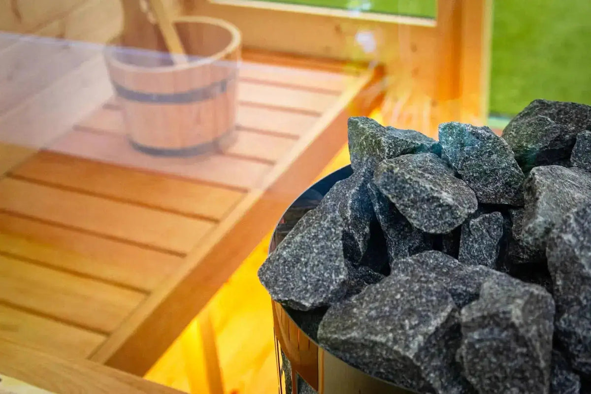 Close-up of sauna stones in Woodpecker 2024 Cube Sauna