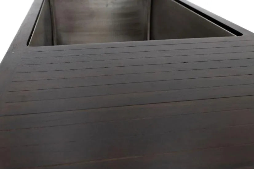 A close-up view of a sleek, dark wooden bench with clean, parallel lines running along its length. The perspective emphasizes the long, smooth surface and the metallic structure in the background, suggesting it could be an elegant piece of modern furniture near a Chill Tubs - Professional affordable Ice Baths ideal for gym fanatics by Chill Tubs for cold water therapy.