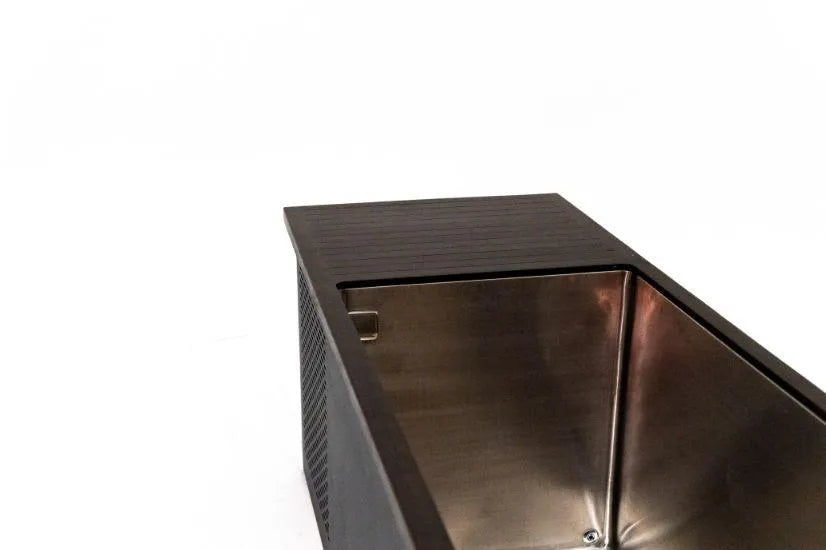 A modern kitchen sink with a sleek, dark wooden countertop extending over the metallic sink basin. The design is minimalist with clean lines and a glossy finish. The sink area appears to be empty and well-lit, emphasizing its contemporary style—perfect for those preparing for cold water therapy or filling Chill Tubs - Professional affordable Ice Baths ideal for gym fanatics by Chill Tubs.