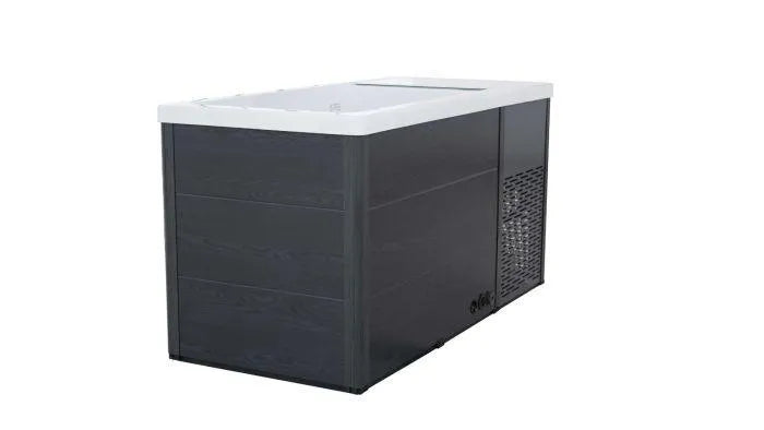 The Chill Tubs Chillax Ice Bath & Chill Tub Professional affordable wellness Ice Baths & Plunge Pool is a large, rectangular, black and white chest freezer with a sleek exterior design. Perfect for cold water immersion or an ice bath to aid in inflammation reduction, the freezer features a top-opening lid and side venting panels. It stands alone on a flat surface, ensuring easy access and functionality.