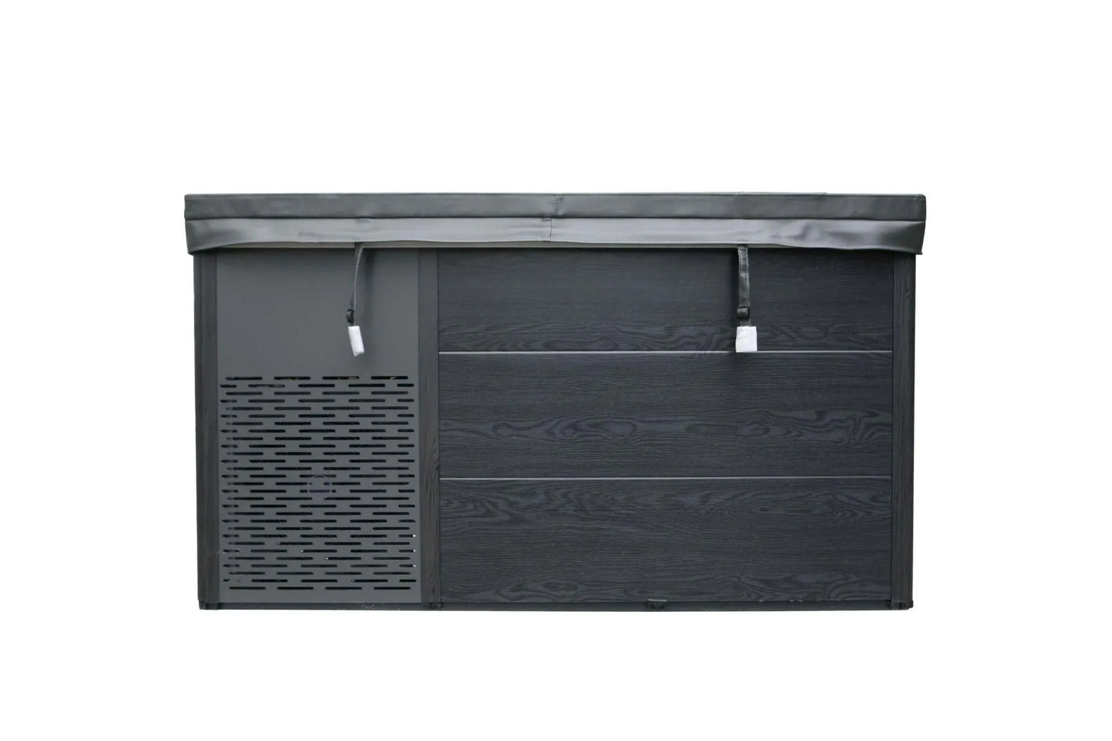 A large rectangular outdoor Chillax Ice Bath & Chill Tub Professional affordable wellness Ice Baths & Plunge Pool with a dark-colored, textured exterior. The tub has a fitted cover, partially open, with straps hanging down. The cover is a lighter color than the body of the tub. Designed for inflammation reduction, it also features an ice bath mode for cold water immersion from Chill Tubs.