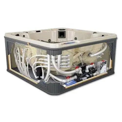 A cutaway of a square hot tub revealing the internal components and plumbing for the Full Hot Tub Service by Hot Tub Liverpool. The exposed section shows a complex network of pipes, valves, and a control system designed for efficient hot tub service. The exterior is gray with a beige interior.