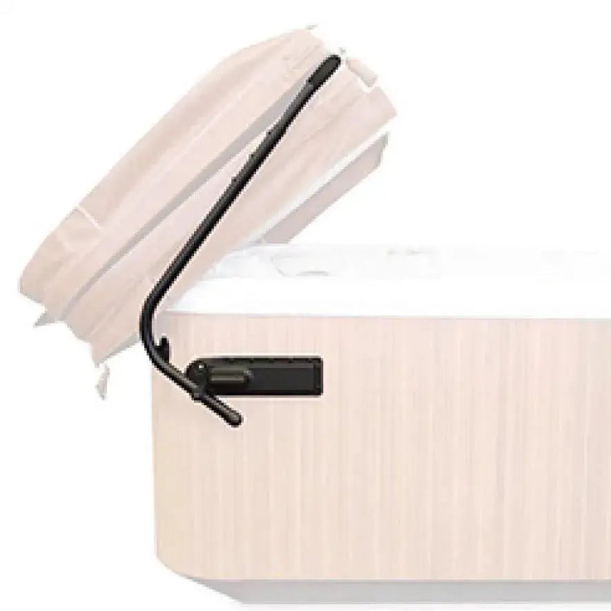 A beige hot tub with its cover partially lifted open by a Hot Tub Liverpool HTL Cover Lifter, revealing the white interior. The cover is supported by a black hinge mechanism to keep it in place. The exterior of the tub has a smooth, wooden-like finish. One of the essential hot tub accessories for convenience and ease!