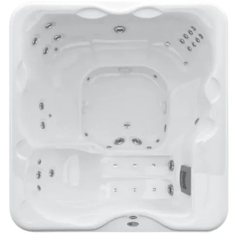 A top-down view of a white, rectangular luxurious Jacuzzi Lodge+L Holiday Let Hot Tub. The Jacuzzi hot tub has multiple built-in seats, each with several water jets for hydrotherapy spread along the edges and at the bases of the seats. The sleek design features molded contours, metallic accents, and an advanced water purification system.