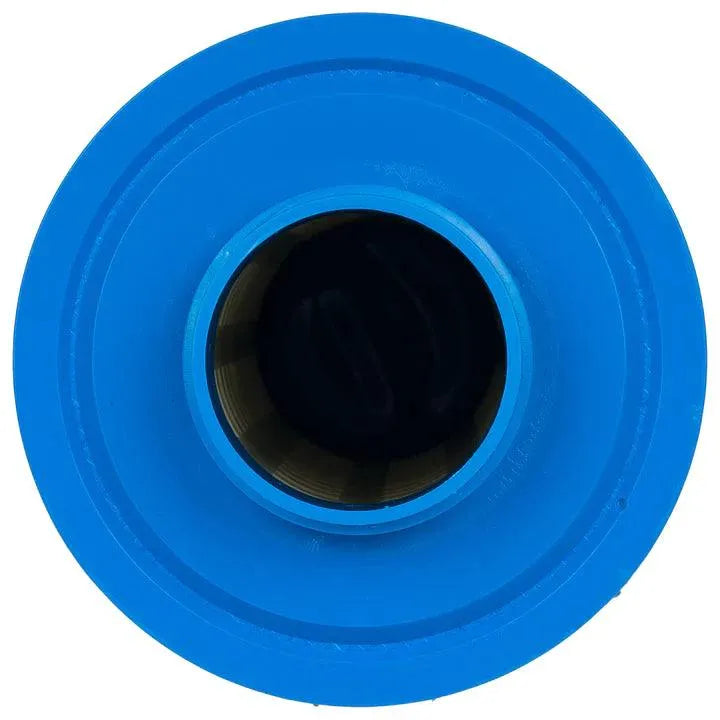 A close-up top-down view of a blue circular object featuring a black inner hole at its center, resembling a Jacuzzi® - J465, J470, J480 to 2012 Small Filter with a cylindrical opening. The outer surface is smooth, and the entire object appears clean and well-defined.