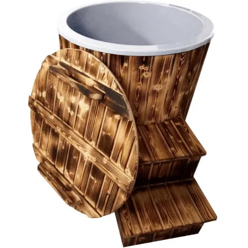 A rustic wooden Solo Ice Bath (Chiller not Included) by Sunbeach Spas with a matching wooden lid and steps, perfect for recovery. The barrel has a round, white interior and a natural wooden exterior, giving it a vintage, handcrafted look. The lid is propped open, showcasing the inside of the Solo Ice Bath (Chiller not Included), ideal for soothing the vagus nerve after intense sessions.