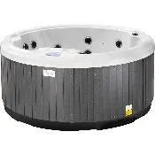 A round, gray, outdoor Hot Tub Liverpool Sunbeach Spas - SB415R - HSG282 (13 Amp) with an Aristech Acrylic Shell, multiple black jets on the interior walls, and a white inner lining. The exterior features vertical panels and a Balboa TP500S Control Panel on the top edge.